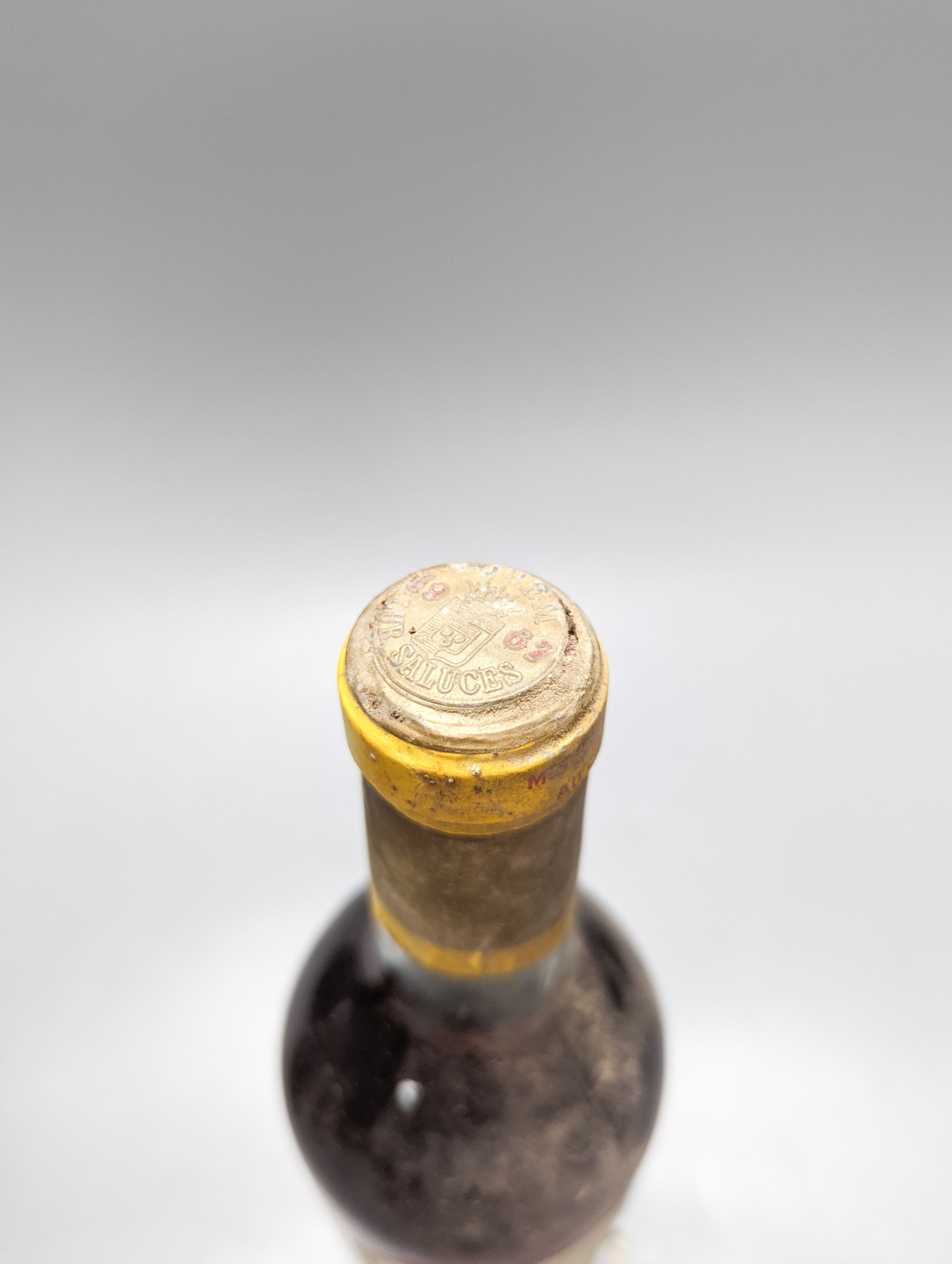 Two bottles of Chateau D'Yquem Sauternes 1967-1965, and a 375ml bottle
